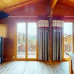 With Spectacular View Of The Peaks